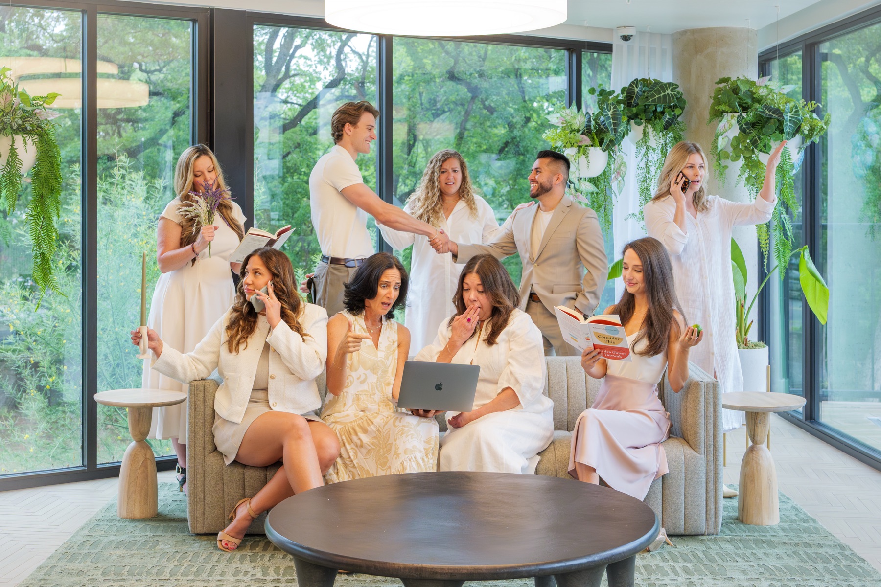 The Krew team together in a bright Austin interior